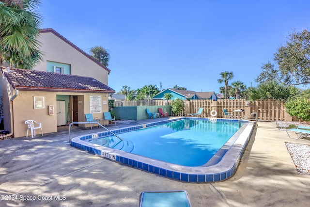 view of pool featuring a patio area