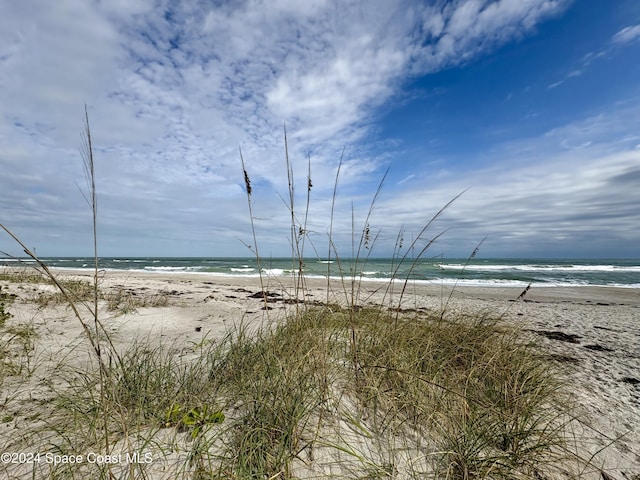 property view of water featuring a view of the beach