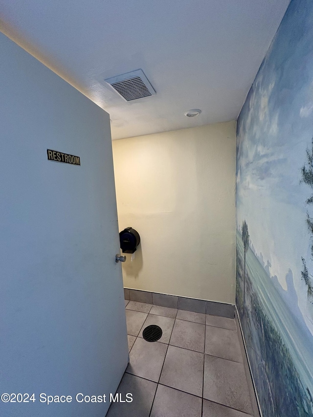 bathroom with tile patterned flooring