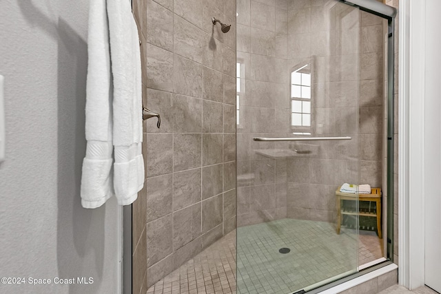 bathroom featuring walk in shower