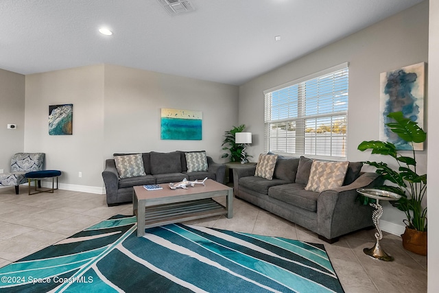 living room featuring light tile patterned floors