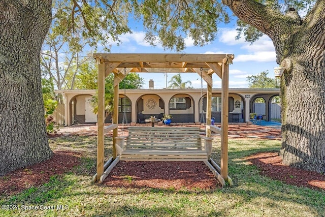 exterior space featuring a pergola