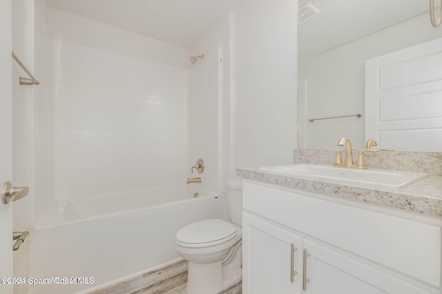 full bathroom with wood-type flooring, vanity, toilet, and shower / washtub combination