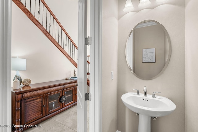 bathroom featuring tile patterned floors and sink