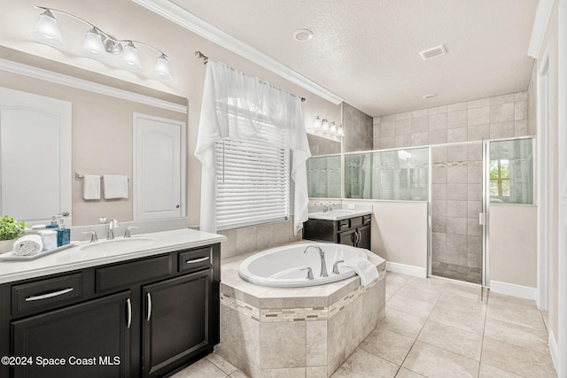 bathroom with vanity, crown molding, tile patterned flooring, a textured ceiling, and shower with separate bathtub