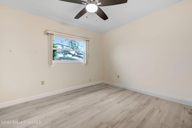 unfurnished room featuring ceiling fan and light hardwood / wood-style flooring