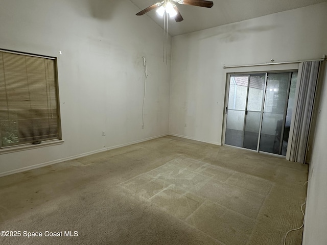 7444 Glenwood Rd, Cocoa, FL 32927 - carpeted empty room with ceiling fan and lofted ceiling