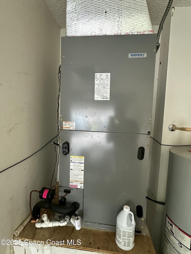 7444 Glenwood Rd, Cocoa, FL 32927 - utilities featuring electric water heater and heating unit