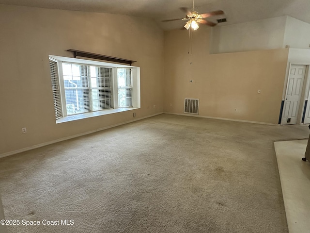 7444 Glenwood Rd, Cocoa, FL 32927 - carpeted spare room with a ceiling fan and a towering ceiling