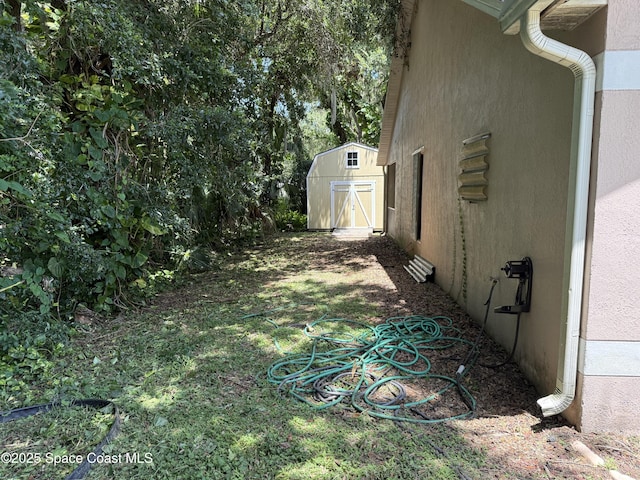 7444 Glenwood Rd, Cocoa, FL 32927 - view of yard featuring a storage shed