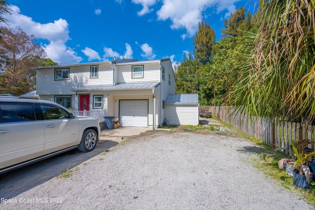 view of property featuring a garage