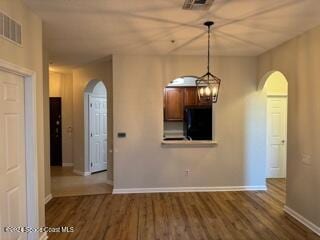 interior space with hardwood / wood-style floors