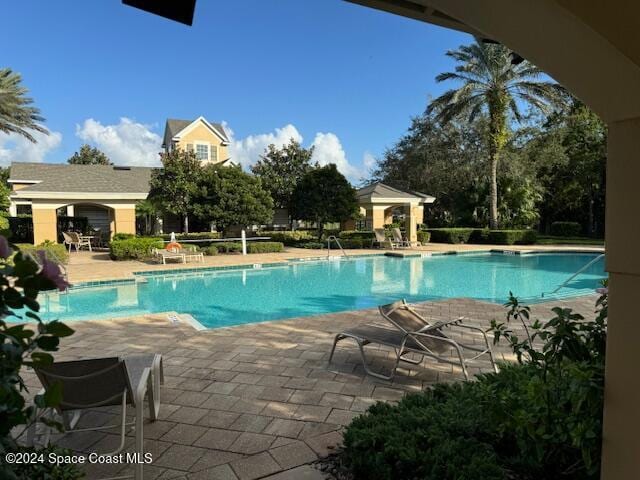 view of pool with a patio area