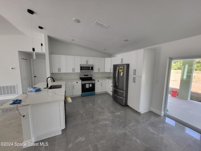 kitchen with light stone counters, stainless steel appliances, pendant lighting, white cabinetry, and lofted ceiling