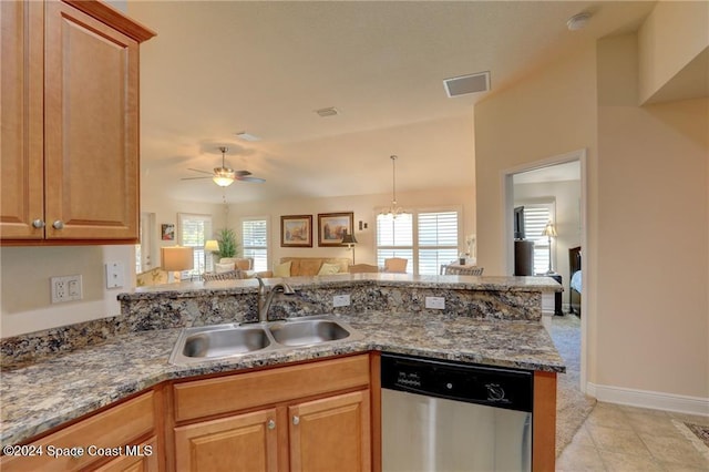 kitchen featuring kitchen peninsula, stainless steel dishwasher, ceiling fan, sink, and light tile patterned floors