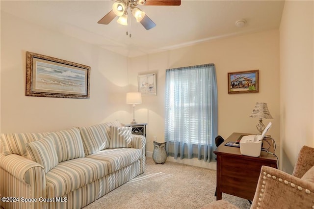 living room with carpet flooring and ceiling fan