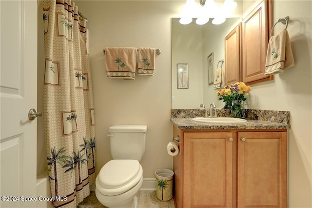 full bathroom with shower / tub combo, vanity, and toilet