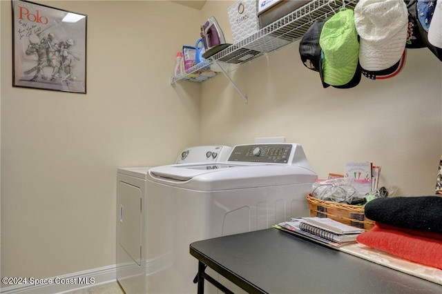 laundry area featuring independent washer and dryer