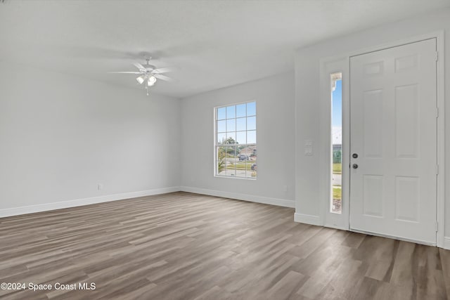 entryway featuring ceiling fan and light hardwood / wood-style flooring