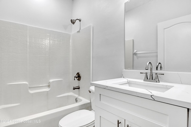 full bathroom with vanity,  shower combination, and toilet