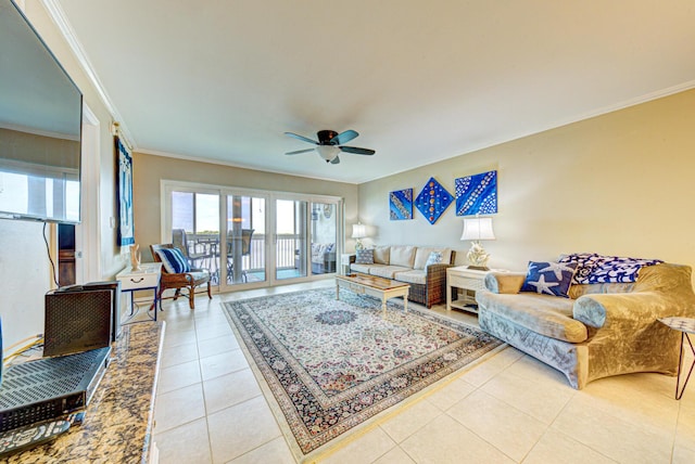 tiled living room with ceiling fan and crown molding