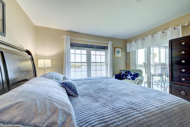 bedroom featuring multiple windows