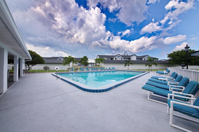 view of pool featuring a patio