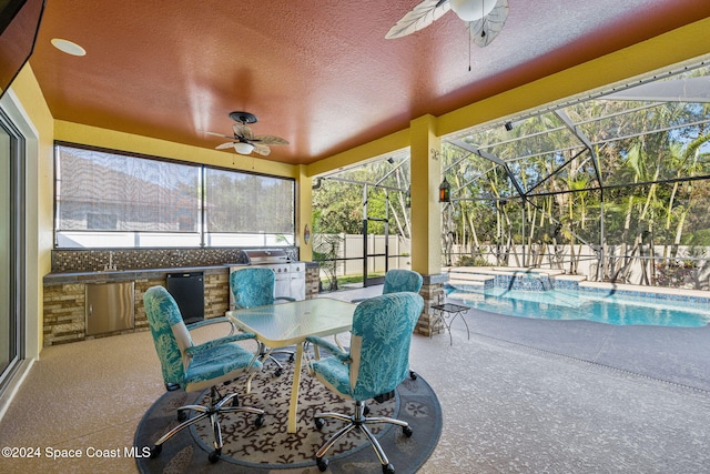 sunroom / solarium with ceiling fan and a swimming pool