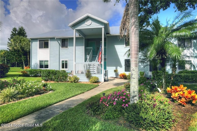 view of front of home featuring covered porch