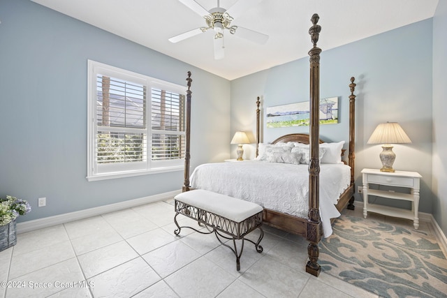 bedroom featuring ceiling fan and light tile patterned flooring