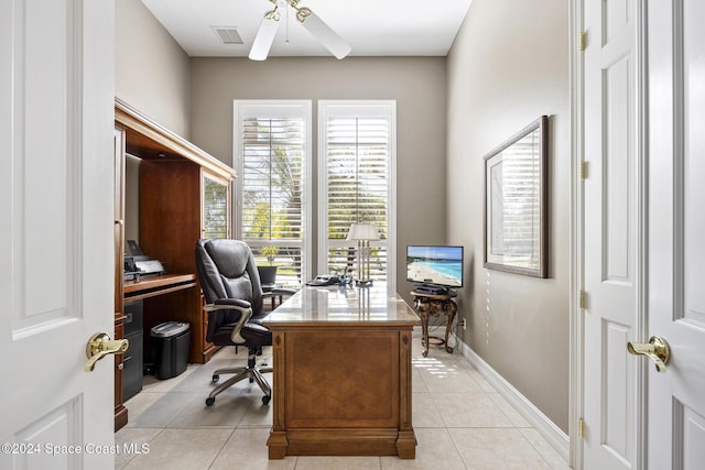 home office with ceiling fan and light tile patterned flooring