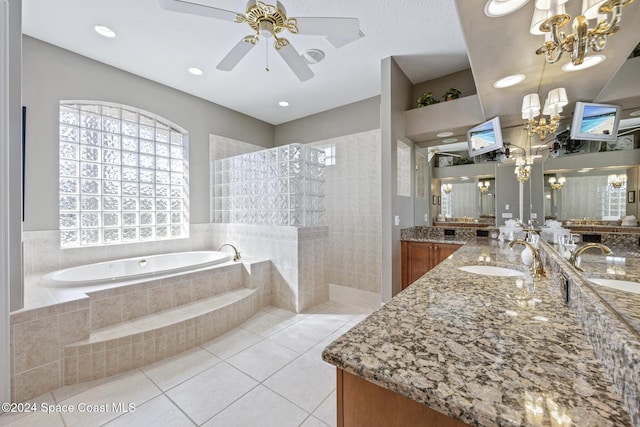 bathroom featuring tile patterned flooring, vanity, separate shower and tub, and ceiling fan with notable chandelier