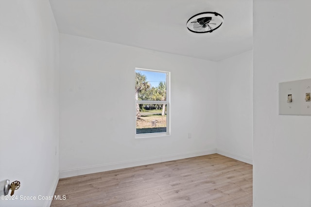 unfurnished room featuring light hardwood / wood-style flooring