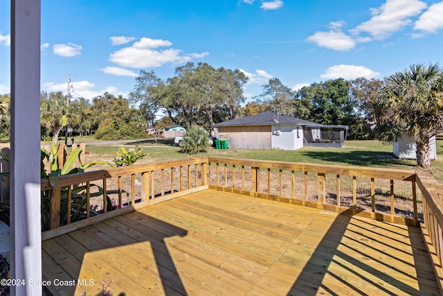 deck featuring a lawn