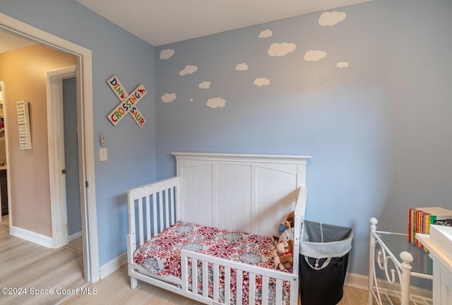 bedroom featuring light hardwood / wood-style flooring