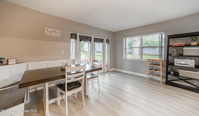 dining space featuring light hardwood / wood-style flooring