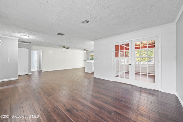 unfurnished living room featuring french doors, ornamental molding, a textured ceiling, ceiling fan, and dark hardwood / wood-style floors