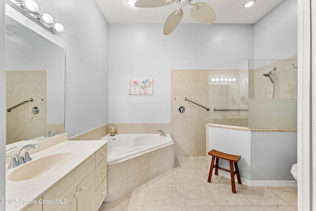 full bathroom featuring tile patterned flooring, toilet, vanity, ceiling fan, and shower with separate bathtub