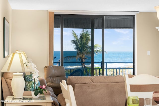 living room featuring a water view