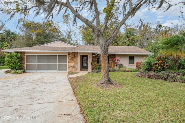 ranch-style house with a front lawn and a garage