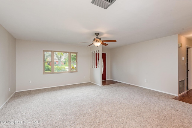 carpeted empty room with ceiling fan