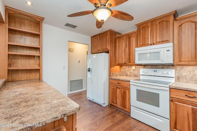 kitchen with backsplash, ceiling fan, dark hardwood / wood-style floors, and white appliances