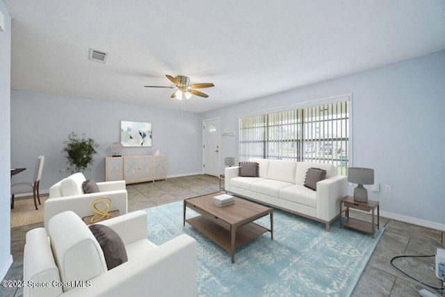 living room featuring ceiling fan