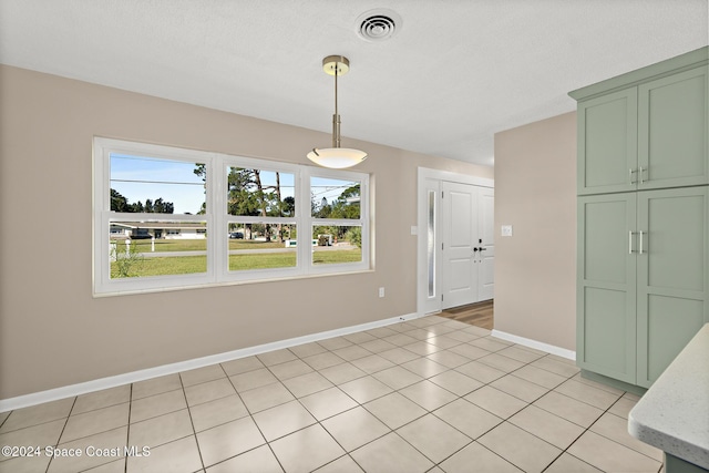 8303 Sylvan Dr, Melbourne, FL 32904 - unfurnished dining area with baseboards