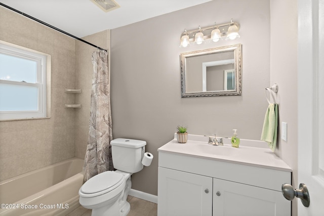 8303 Sylvan Dr, Melbourne, FL 32904 - full bath with vanity, toilet, shower / bath combo, and baseboards