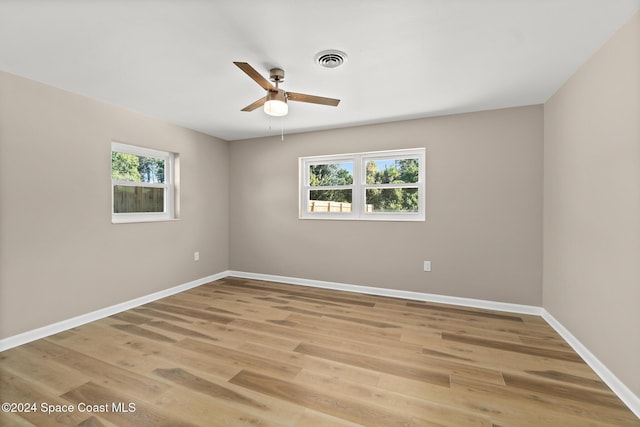 8303 Sylvan Dr, Melbourne, FL 32904 - empty room with ceiling fan, baseboards, and light wood-style floors