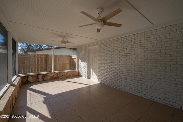 exterior space featuring ceiling fan