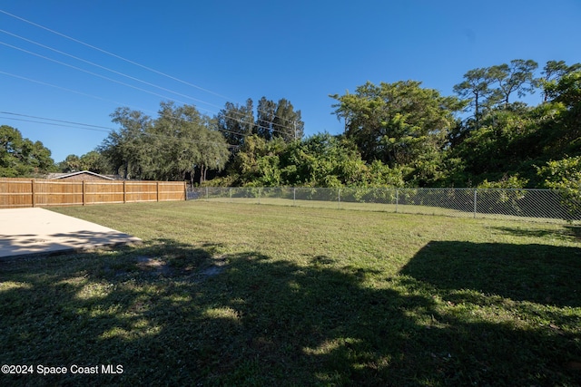8303 Sylvan Dr, Melbourne, FL 32904 - view of yard with a patio area