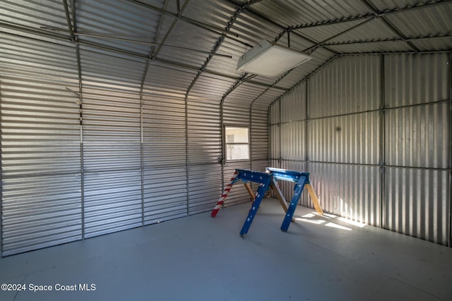 8303 Sylvan Dr, Melbourne, FL 32904 - garage featuring metal wall