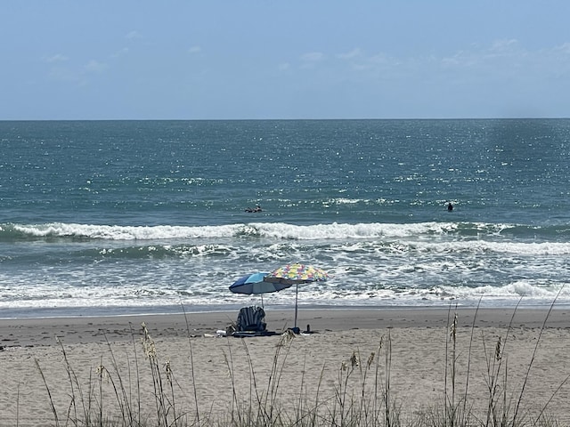 view of water feature featuring a beach view